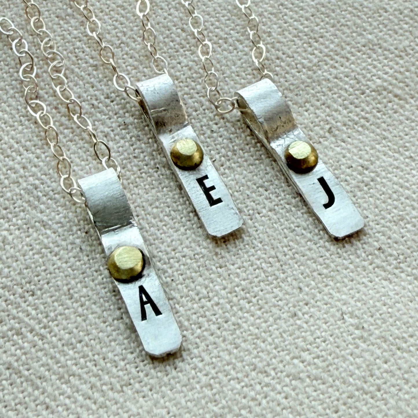 Teeny Tiny Sterling Silver Initial Charm Necklace with Hand Riveted Golden Accents | Art Deco Initial - drake designs jewelry