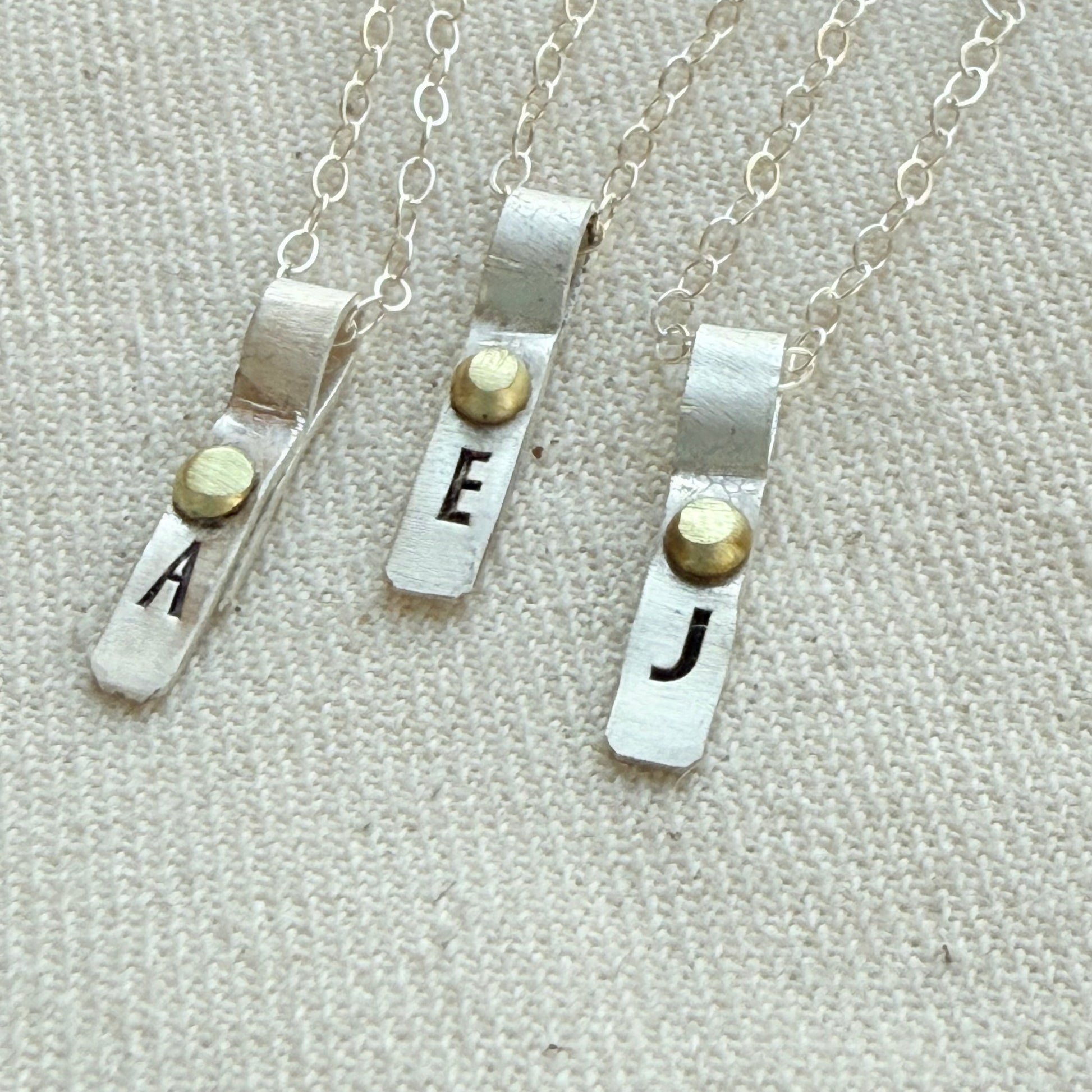 Teeny Tiny Sterling Silver Initial Charm Necklace with Hand Riveted Golden Accents | Art Deco Initial - drake designs jewelry