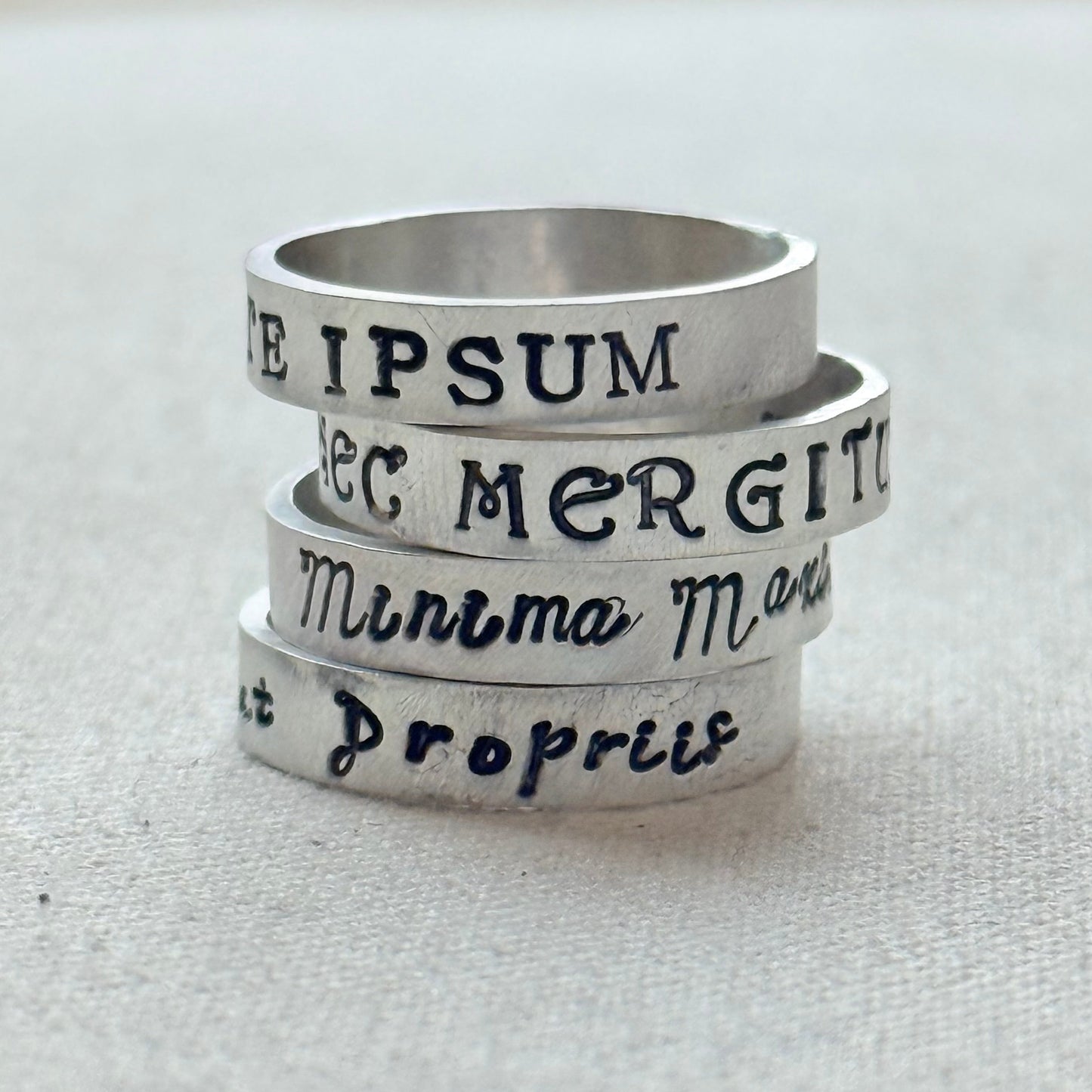 Sterling silver Poesy, Posy, Posey or Posie rings for mom with kids' names or mantra are hand stamped in font of your choice - drake designs jewelry