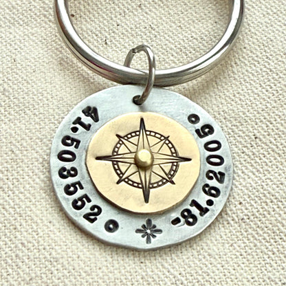 Custom coordinates keychain with gold compass riveted to silver pendant - hand stamped with personalized latitude and longitude - Drake designs jewelry