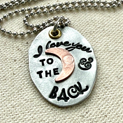 I Love You to the moon and back Necklace   - Oval Silver Pendant with hand riveted copper moon and golden brass accents - Drake  Designs Jewelry