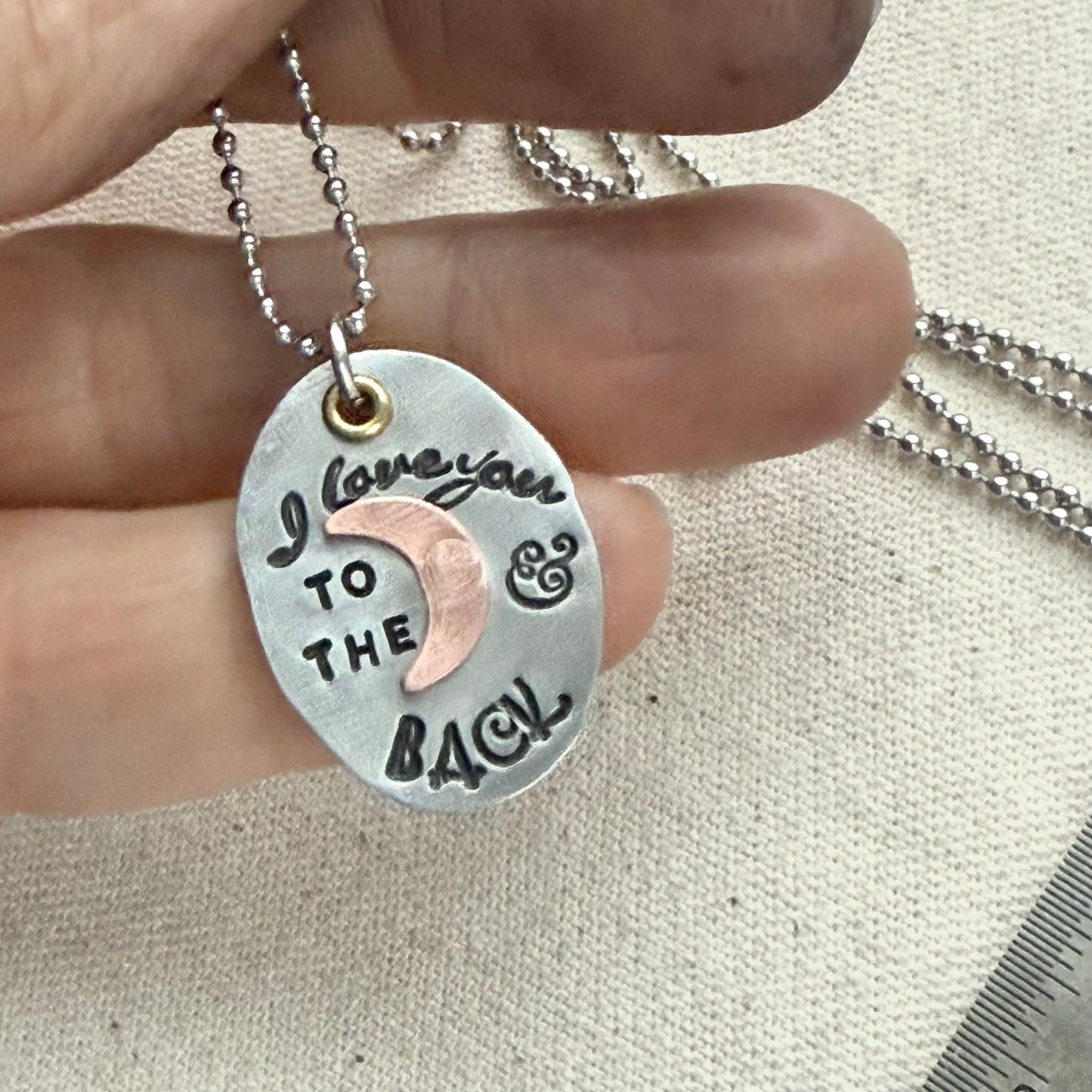 I Love You to the moon and back Necklace   - Oval Silver Pendant with hand riveted copper moon and golden brass accents - Drake Designs Jewelry