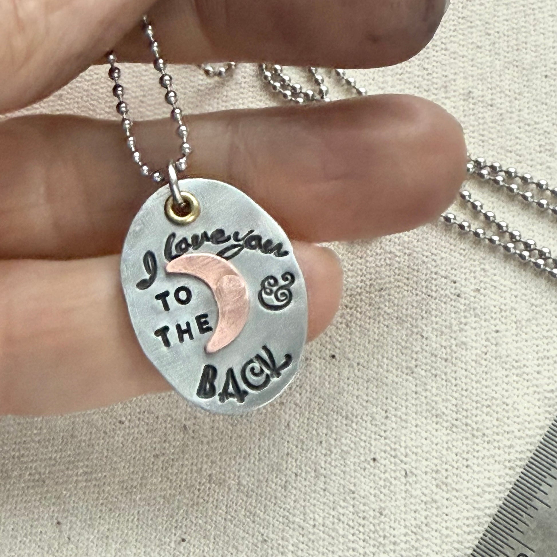I Love You to the moon and back Necklace   - Oval Silver Pendant with hand riveted copper moon and golden brass accents - Drake Designs Jewelry