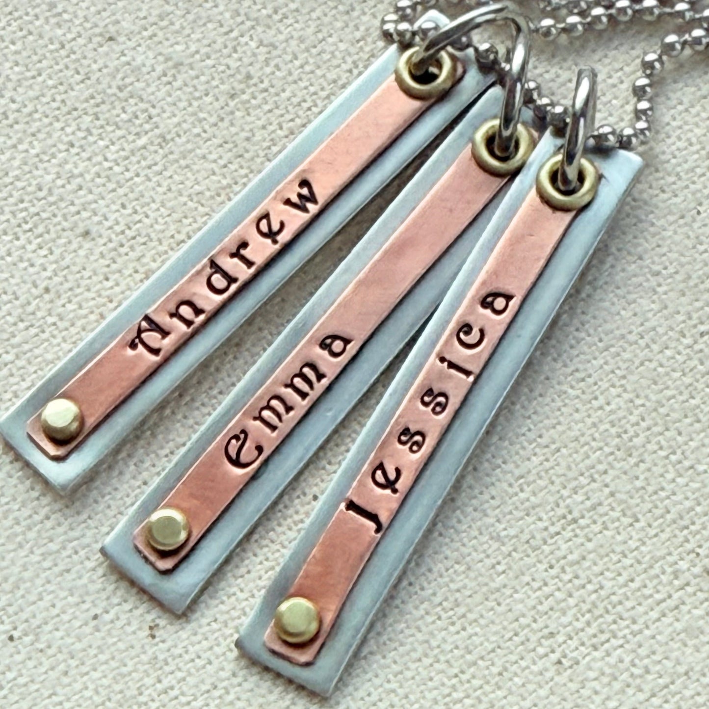 Mixed metal silver copper and gold name bar necklace with layered riveted bars hand stamped with kids names - drake designs jewelry