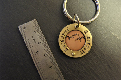 custom mountain keychain with personalized coordinates in mixed metal gold and copper - drake designs jewelry