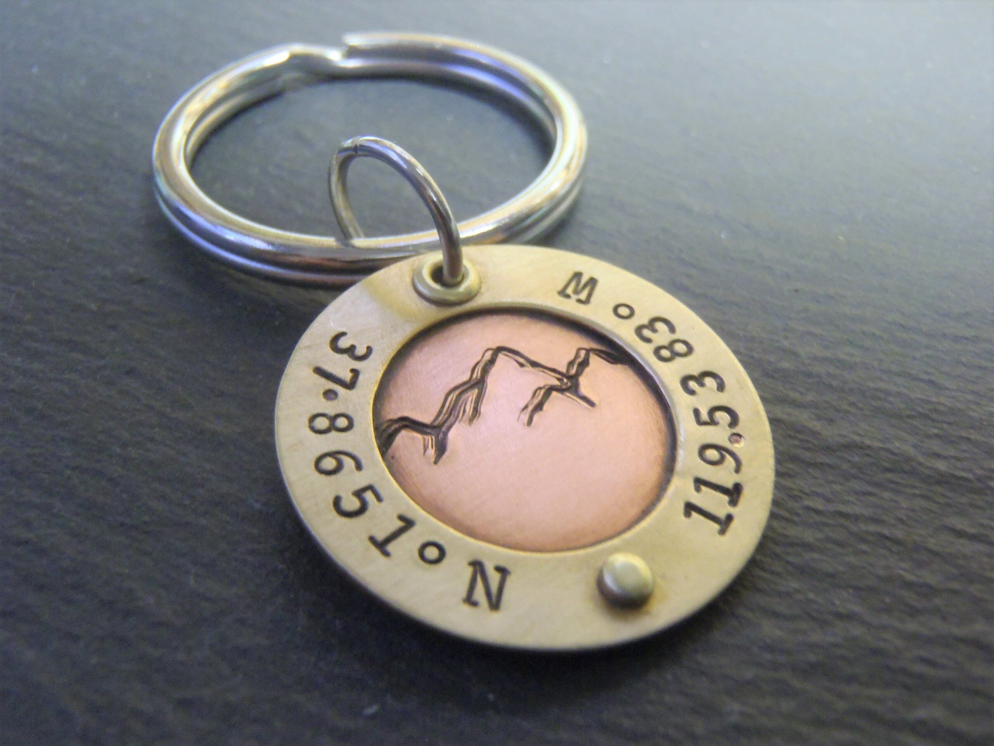 custom mountain keychain with personalized coordinates in mixed metal gold and copper - drake designs jewelry