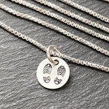Tiny sterling silver boot print necklace for hiker or outdoors woman. drake designs jewelry