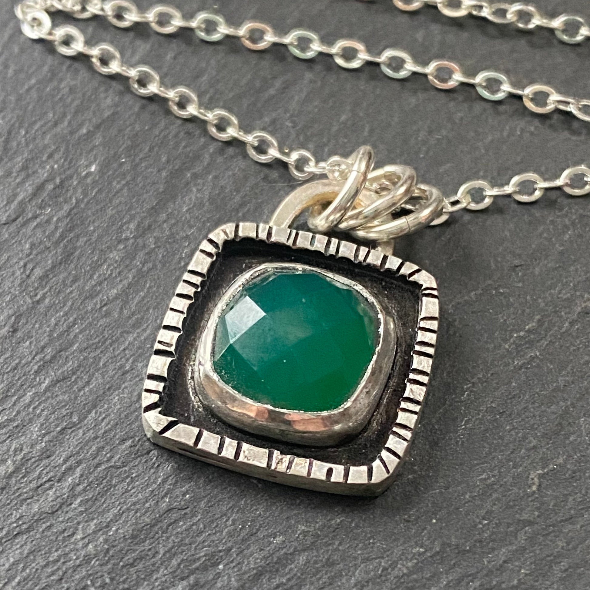 A sterling silver necklace with a green onyx pendant, recycled_silver_wire_and_chain,drake designs jewelry