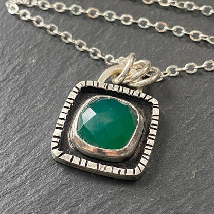 A sterling silver necklace with a green onyx pendant, recycled_silver_wire_and_chain,drake designs jewelry
