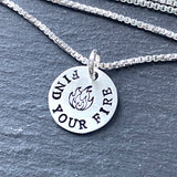 sterling silver find your fire necklace with fire flame image stamped at center. drake designs jewelry