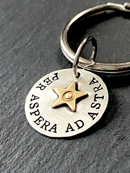per aspera ad astra. from hardship to the stars. latin phrase keychain  sterling silver with gold star. drake designs jewelry