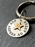 per aspera ad astra. latin phrase keychain hand stamped sterling silver with gold star. drake designs jewelry