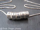 Mother's necklace with children's names on Small sterling silver ring charms - Drake Designs Jewelry