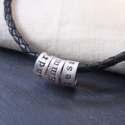 Leather necklace with sterling silver name charms personalized