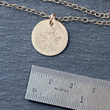 Queen Bee necklace with Rope edge border and bee with crown hand stamped on 14k gold fill pendant.  drake designs jewelry  Edit alt text