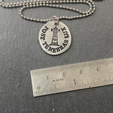 hand stamped latin phrase jewelry with lighthouse. post tenebras lux. after darkness light inspirational Latin quote necklace. drake designs jewelry