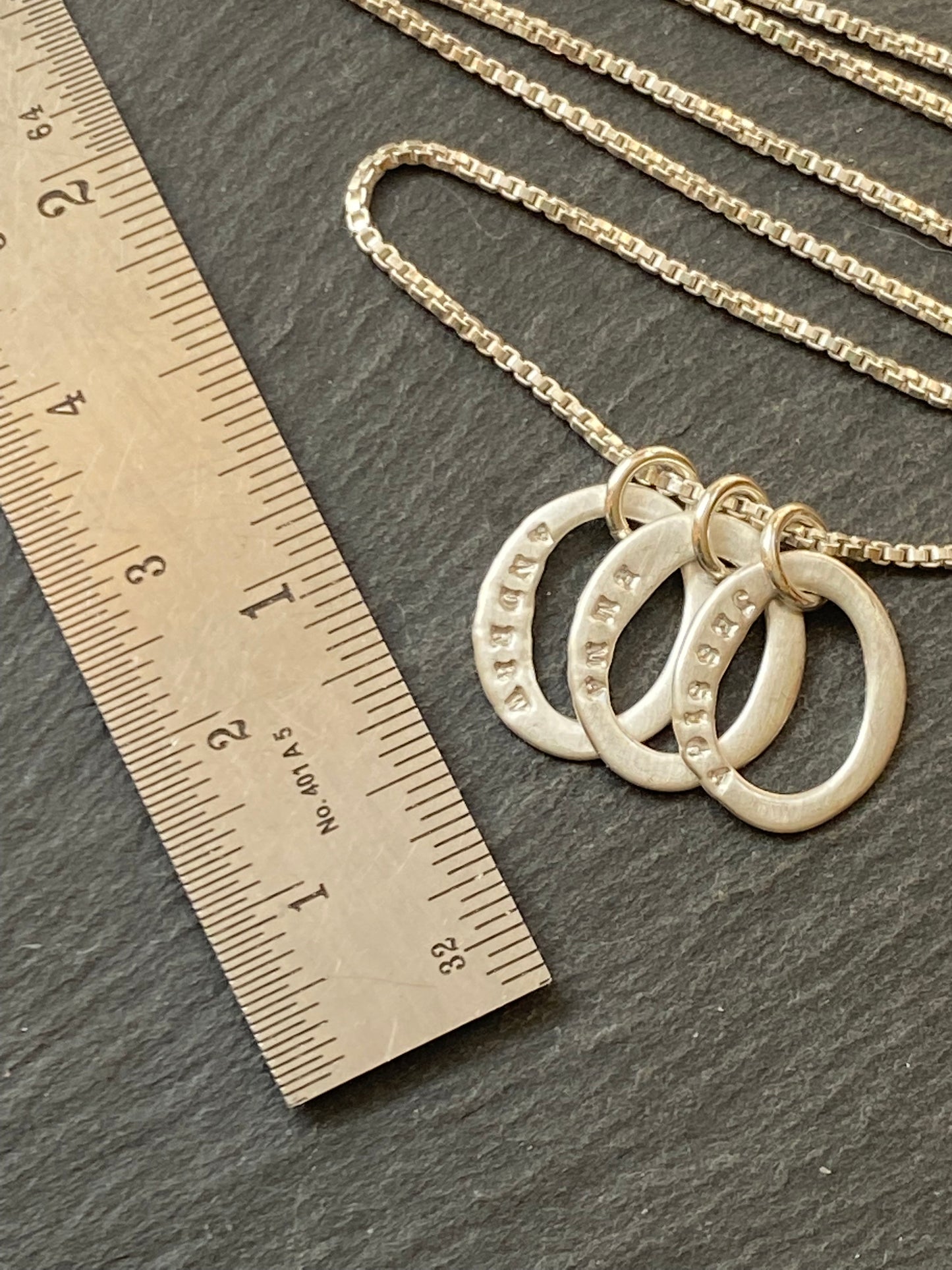 sterling silver mom necklace hand stamped on tiny organic oval ring charms - drake designs jewelry