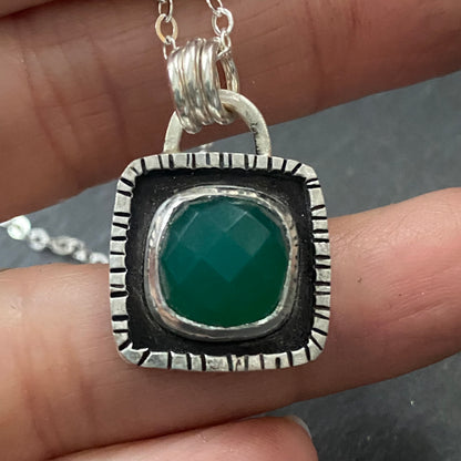 A sterling silver necklace with a green onyx pendant - natural gemstone with raised edge organically shaped pendant - drake designs jewelry
