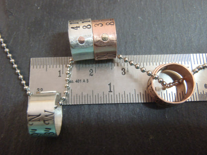 sterling silver or copper charms are personalized with latitude longitude coordinates - Drake Designs Jewelry