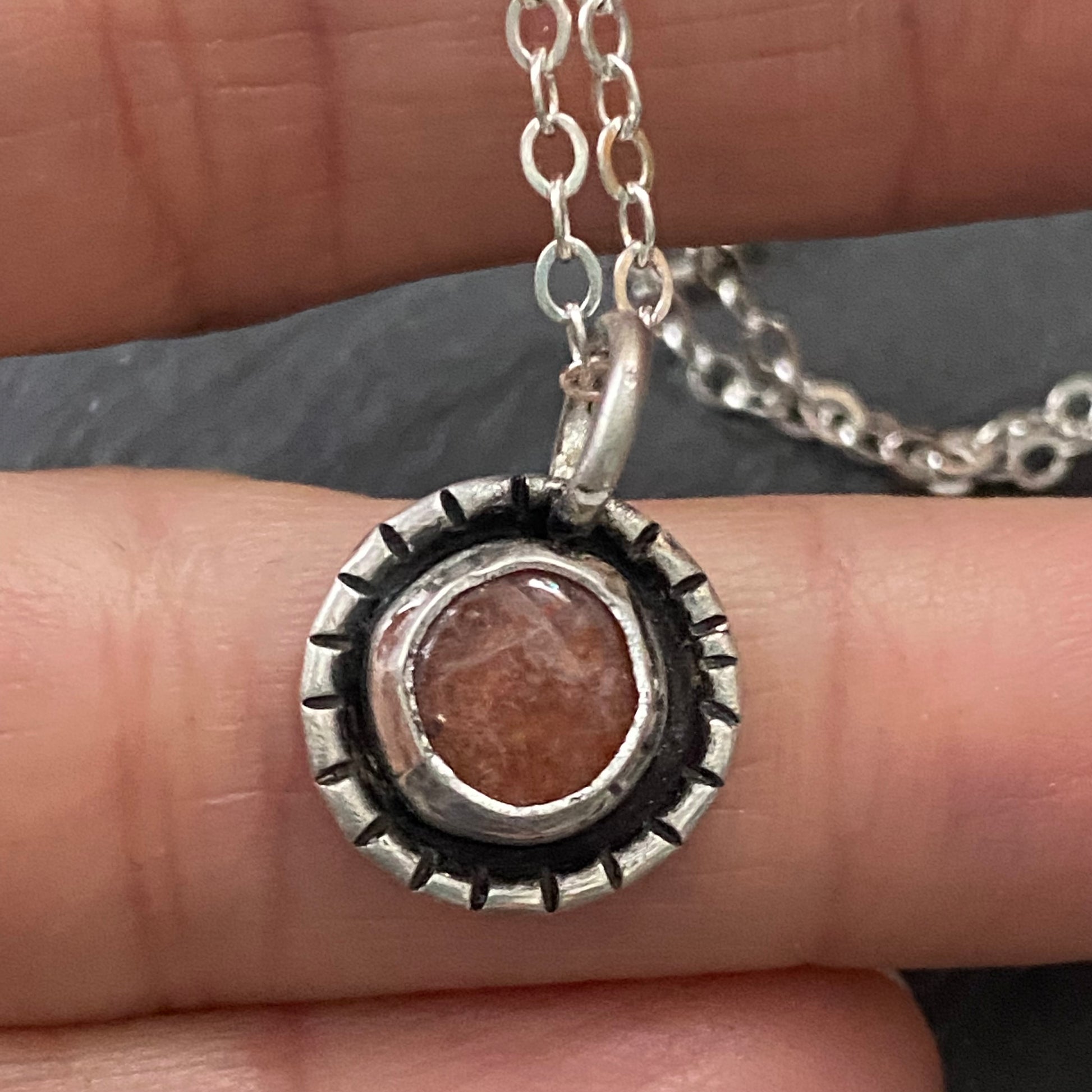 Sterling silver sunstone necklace. Sun with rays created with recycled sterling silver and genuine sunstone is hand set into hand made bezel. Sparkly orange sunstone necklace - drake designs jewelry