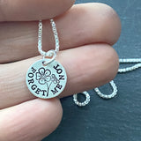 Hand stamped Forget Me Not flower Necklace. Symbol of Remembrance and Everlasting Love. sterling silver with brushed finish. drake designs jewelry