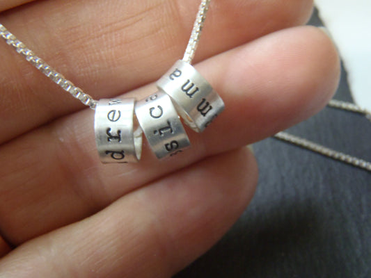 sterling silver mothers necklace with childrens names. drake designs jewelry