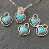 sterling silver turquoise heart necklace hand crafted from Kingman turquoise heart hand set in sterling silver bezel with organically shaped border - drake designs jewelry