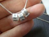 Mother's necklace with children's names on Small sterling silver ring charms - Drake Designs Jewelry