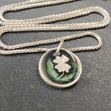 wax seal clover necklace organically shaped by hand.  green clover tiny wax seal. drake designs jewelry