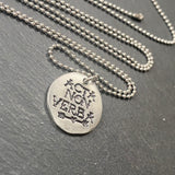 organically shaped pendant latin phrase jewelry.  acta non verba necklace. deeds not words. drake designs jewelry