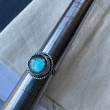 sterling silver labradorite ring hand crafted with rope band .  Labradorite with flash is hand set in sterling silver bezel - drake designs jewelry