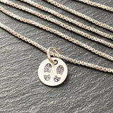 Boot print necklace for hiker or outdoors woman in sterling silver.  drake designs jewelry