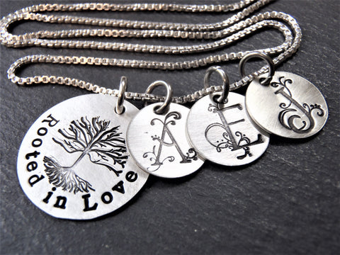 Rooted in love mom necklace with kids initials.  sterling silver family necklace hand stamped in sterling silver. drake designs jewelry