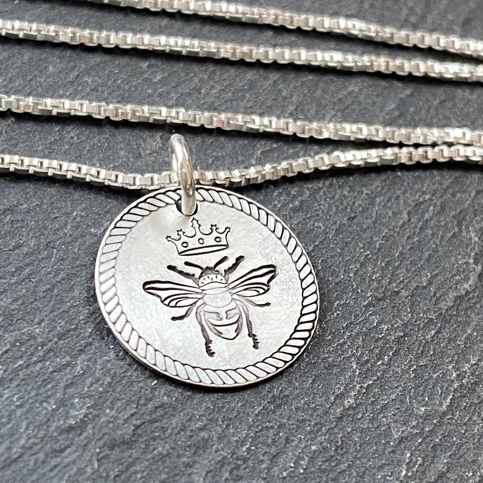 Queen bee necklace hand on sterling silver with a brushed finish. drake designs jewelry