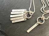 sterling silver mom necklace with kids names hand stamped on thick rectangle charms that dangle from twist rope wire ring  - drake designs jewelry