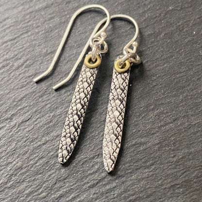 snake print earrings hand crafted from sterling silver and golden brass. snake texture bar dangle earrings. drake designs jewelry
