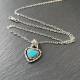 sterling silver turquoise heart necklace hand crafted from Kingman turquoise heart hand set in sterling silver bezel with organically shaped border - drake designs jewelry