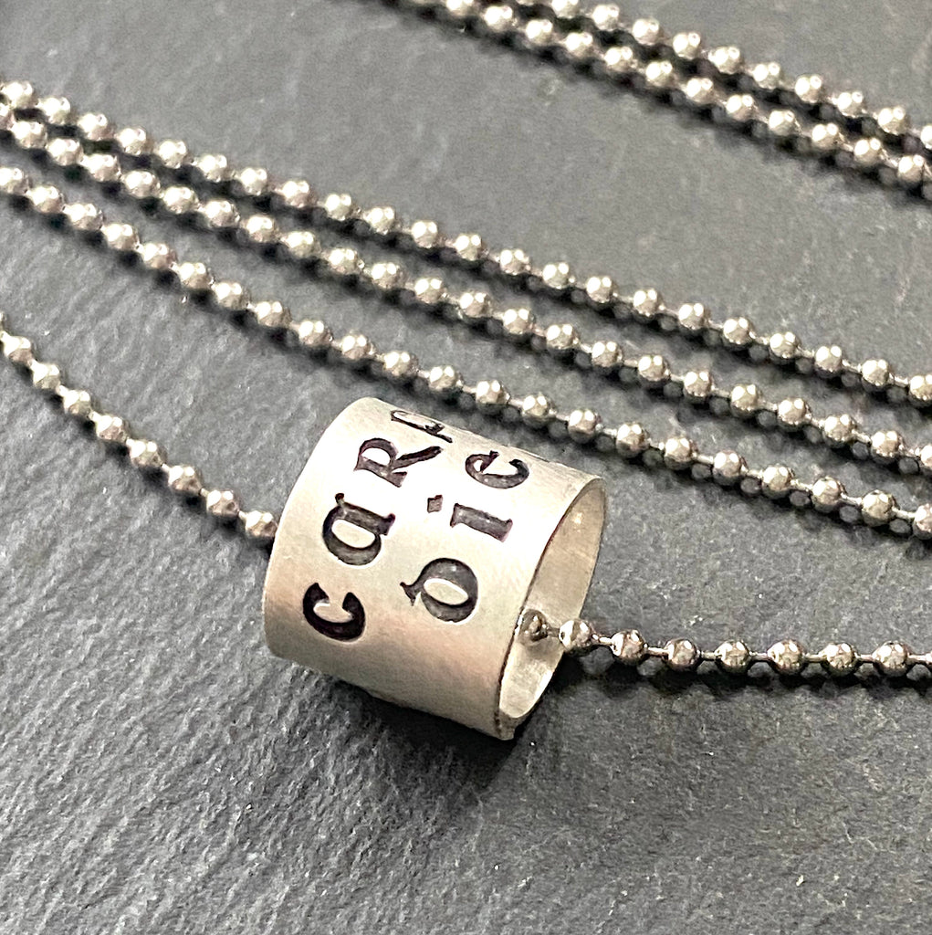 Carpe Diem necklace.  hand crafted sterling silver ring charm with copper rivet.  seize the day latin phrase ring charm necklace. drake designs jewelry