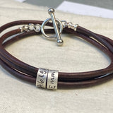 triple wrapped toggle clasp leather bracelet with personalized sterling silver charms with kids names - drake designs jewelry 