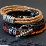 mens braided leather bracelet with toggle clasp and personalized sterling silver name charms