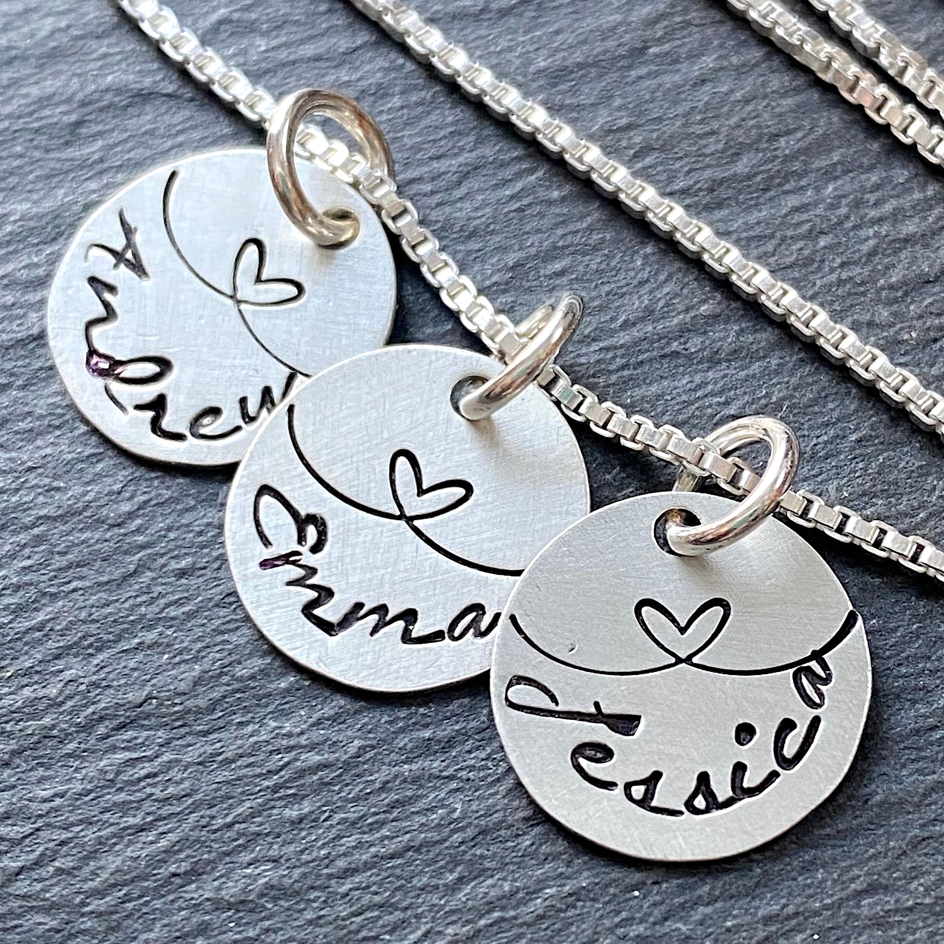 linked by love sterling silver charm mom necklace with kids names and heart links hand stamped.  small charm necklace with childrens names.  drake designs jewelry