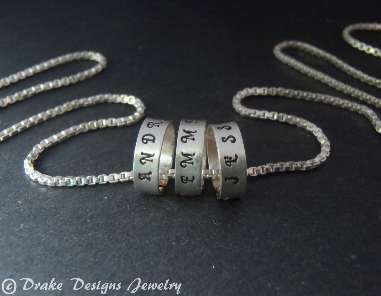 tiny hand stamped name charms on  Sterling silver mothers necklace personalized with kids names - Drake Designs Jewelry