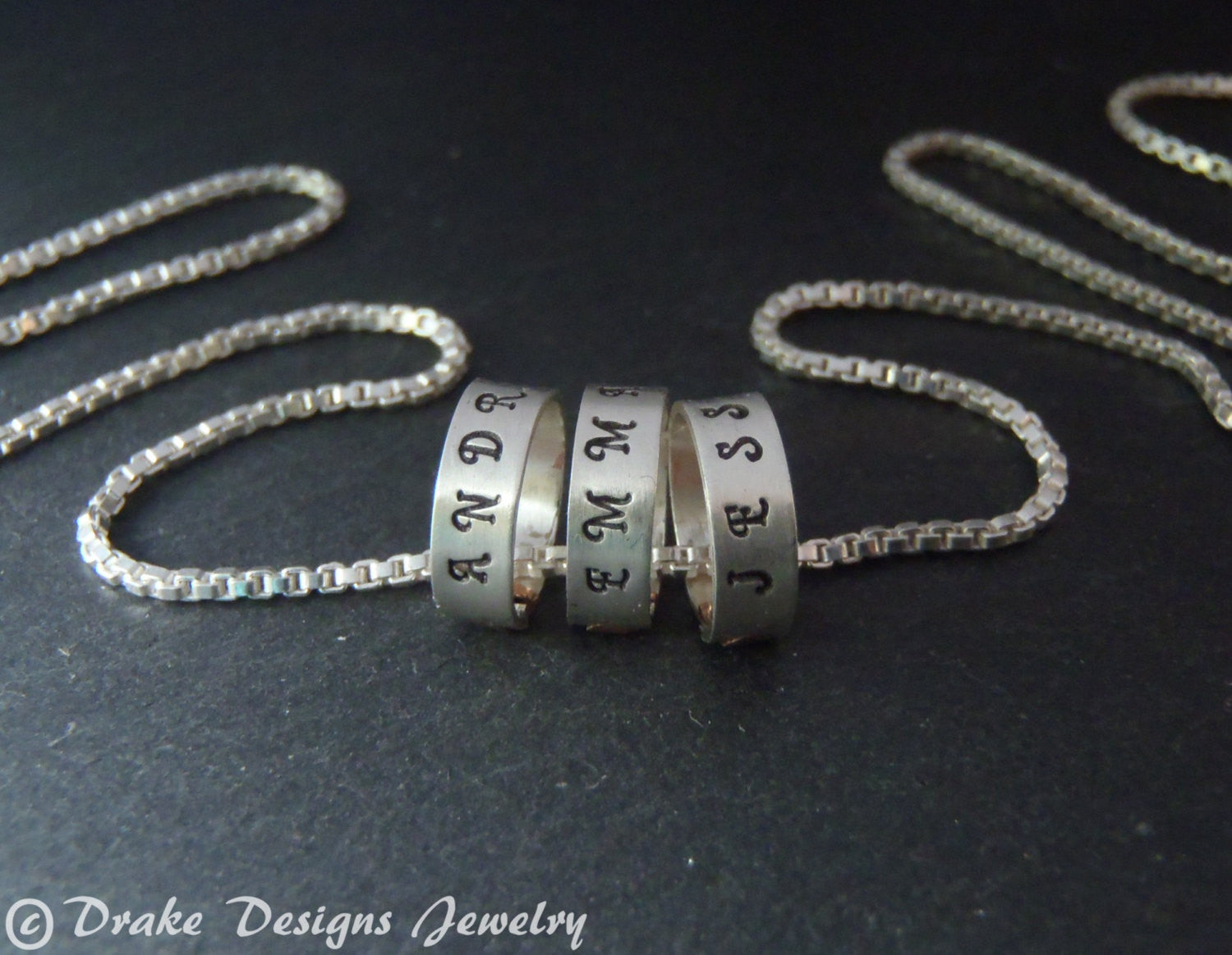 tiny hand stamped name charms on  Sterling silver mothers necklace personalized with kids names - Drake Designs Jewelry