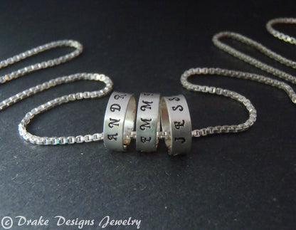 tiny hand stamped name charms on  Sterling silver mothers necklace personalized with kids names - Drake Designs Jewelry