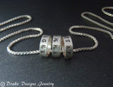 tiny hand stamped name charms on  Sterling silver mothers necklace personalized with kids names - Drake Designs Jewelry