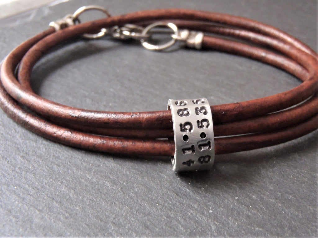 personalized leather coordinates bracelet for men or women with gps latitude and longitude hand stamped on charms