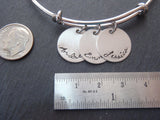 Mother's bracelet with children's name charms in script font on an adjustable bangle bracelet - Drake Designs Jewelry