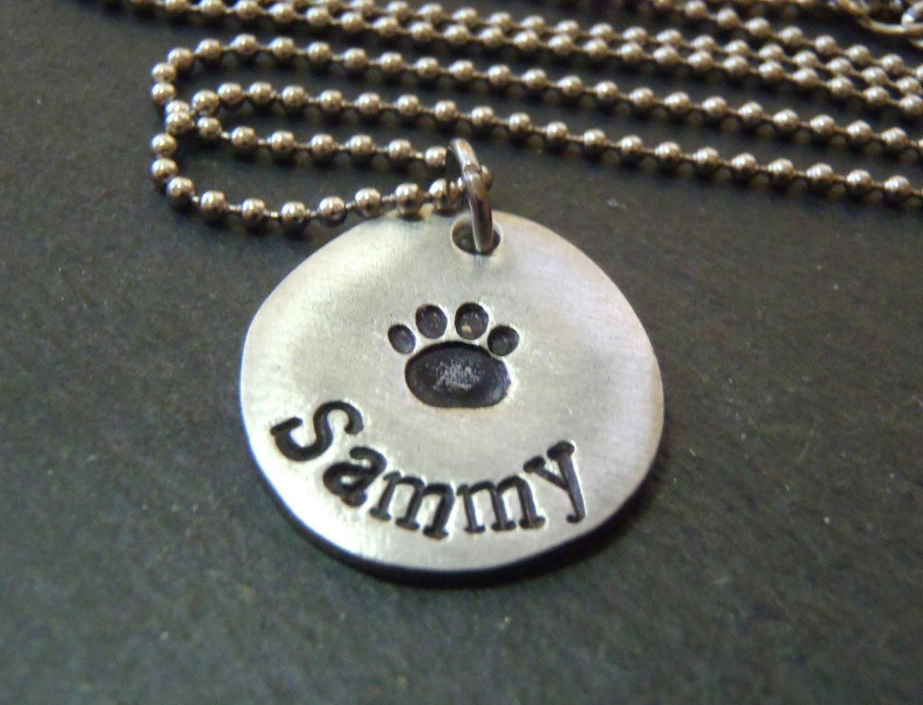 Personalized pet paw print necklace with pet's name hand stamped - Drake Designs Jewelry