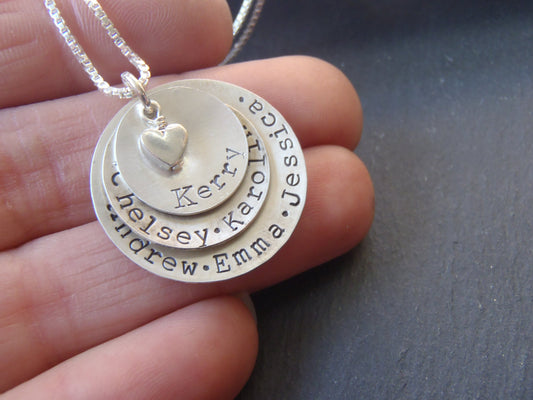 Layered mom necklace with names. Hand crafted from solid Sterling silver, slightly concave with a heart nestled at the center - Drake Designs Jewelry
